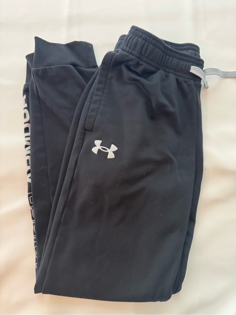 Under Armour Kids Black Brawler Tapered Pants with White Logo